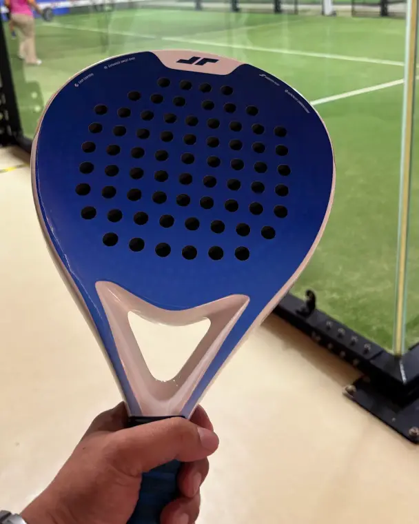 A blue padel racket